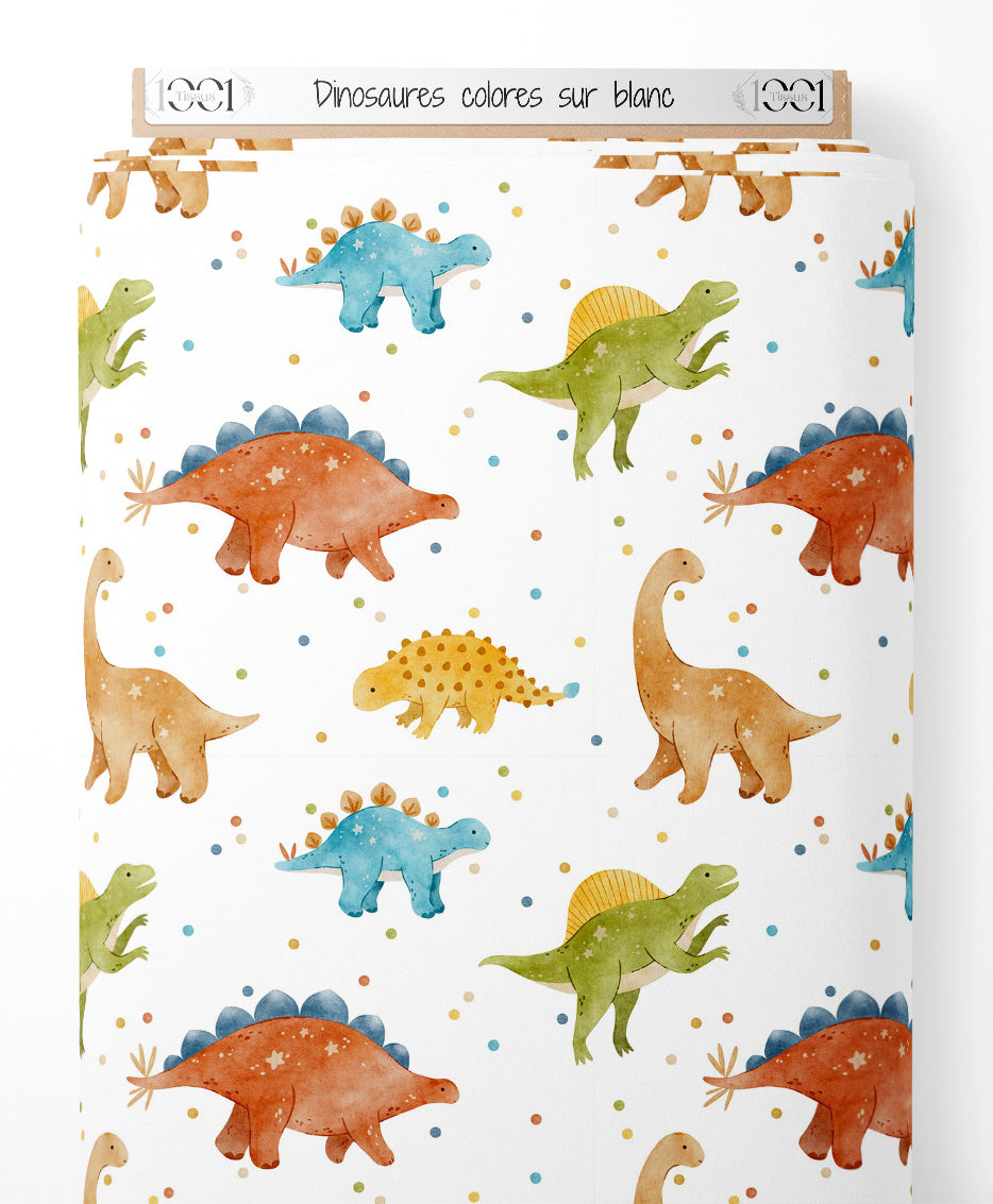 Tissu - Dinosaures colorés sur blanc