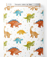 Tissu - Dinosaures colorés sur blanc