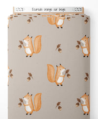Tissu - Écureuils orange sur beige