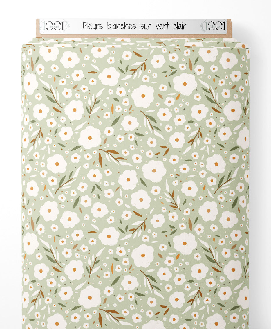 Tissu - Fleurs blanches sur vert clair