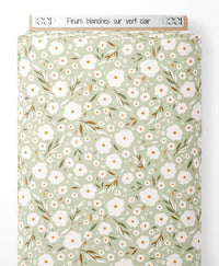 Tissu - Fleurs blanches sur vert clair