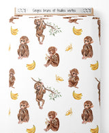 Tissu - Singes bruns et feuilles vertes