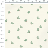 Tissu - Papillons verts sur fond crème