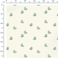 Tissu - Papillons verts sur fond crème