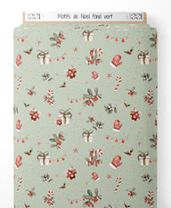 Tissu - Motifs de Noël sur fond vert