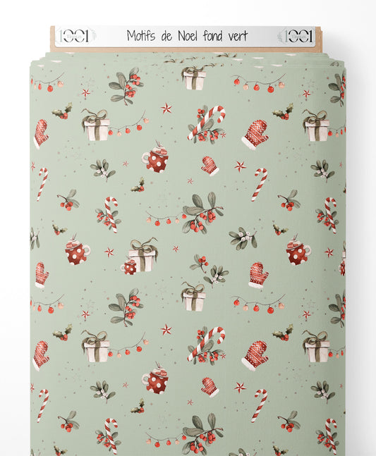 Tissu - Motifs de Noël sur fond vert