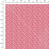 Tissu - Pois rouges sur fond rose